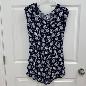 Navy forever 21 romper with white floral pattern. Size medium.